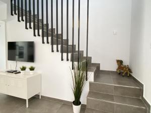 TV a/nebo společenská místnost v ubytování Casa Los Tejares Casasol