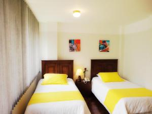 Postel nebo postele na pokoji v ubytování Hotel Rincón Escandinavo