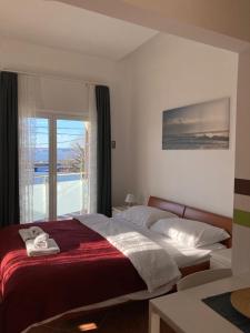 Кровать или кровати в номере Apartments Ivančić