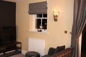 Foto dalla galleria di Canal view 2 bed picturesque cottage with log fire a Blisworth