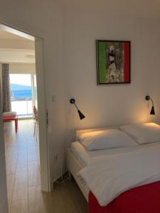 En eller flere senge i et værelse på Apartments Ivančić 2 + 70 billeder