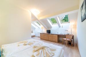 Posteľ alebo postele v izbe v ubytovaní Hotel Vyhlídka