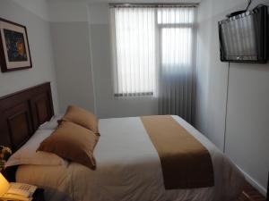 Letto o letti in una camera di Hotel Rincón Escandinavo