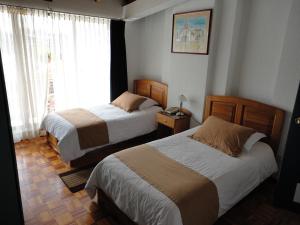 Letto o letti in una camera di Hotel Rincón Escandinavo