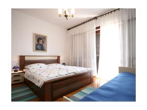 Posteľ alebo postele v izbe v ubytovaní Apartment Rustico