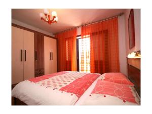 Posteľ alebo postele v izbe v ubytovaní Apartment Rustico