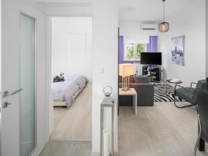 TV a/nebo společenská místnost v ubytování Apartments Aida