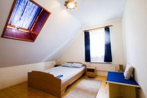 Llit o llits en una habitació de Holiday Home Juričko