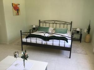 A bed or beds in a room at Villa Ida