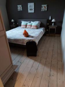 Postel nebo postele na pokoji v ubytování B&B Le Notaire