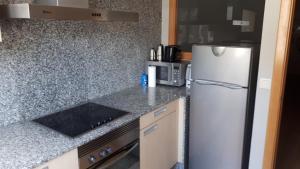 Kuchyň nebo kuchyňský kout v ubytování Blanco Albergue
