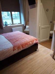 Postel nebo postele na pokoji v ubytování B&B Le Notaire