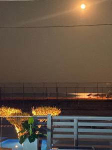 a view of an airport at night with a fence at Anastasia Boutique Suites -Adults only & kids 12 plus in Asprovalta