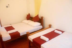 Postel nebo postele na pokoji v ubytování Chipmunk Home Stay