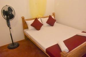 Postel nebo postele na pokoji v ubytování Chipmunk Home Stay
