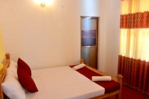 Postel nebo postele na pokoji v ubytování Chipmunk Home Stay