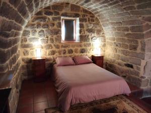 Postel nebo postele na pokoji v ubytování Le Relais des Bouziges + 37 fotografií