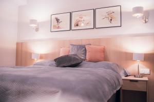 Posteľ alebo postele v izbe v ubytovaní Harmonia Apartamenty Ustroń