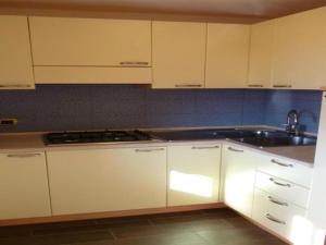 Kuchyň nebo kuchyňský kout v ubytování Andreis Apartments