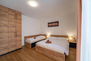 Posteľ alebo postele v izbe v ubytovaní Apartmán na Bukovce MALMA