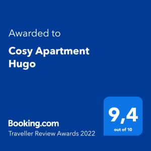 a blue screen with the text awarded to cosy apartment hugo at Cosy Apartment Hugo in Osijek