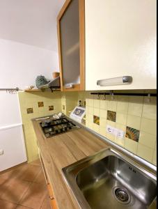 A kitchen or kitchenette at Giuali'