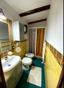 Koupelna v ubytování Giuali'