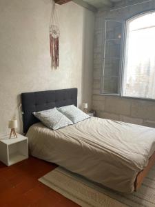 En eller flere senge i et værelse på "L'artistique" Centre Arles Fondation Van Gogh