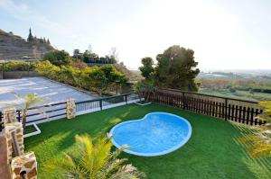 Výhled na bazén z ubytování Cortijo las Caballerizas nebo okolí