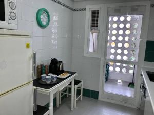 Kuchnia lub aneks kuchenny w obiekcie Residencial las Flores Marbella