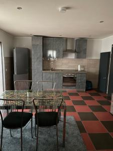Kuchyň nebo kuchyňský kout v ubytování Hotel Roma