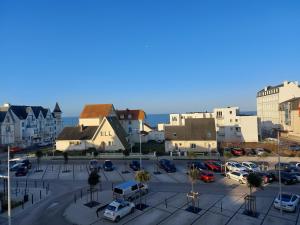 Budova, kde se apartmán nachází + 2 fotografie