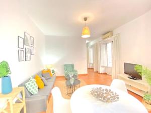 A television and/or entertainment centre at SuperB Apartment in downtown of Sevilla ,parking optional, Top !!