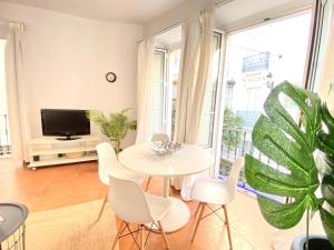 A television and/or entertainment centre at SuperB Apartment in downtown of Sevilla ,parking optional, Top !!