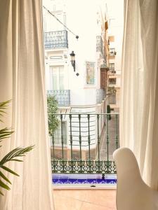 A balcony or terrace at SuperB Apartment in downtown of Sevilla ,parking optional, Top !!