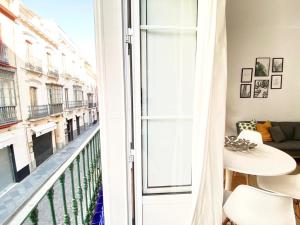 A balcony or terrace at SuperB Apartment in downtown of Sevilla ,parking optional, Top !!