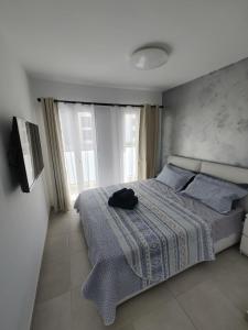 Postel nebo postele na pokoji v ubytování Rizi Corralejo Sun