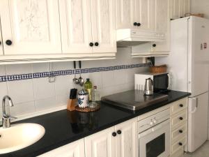 Kuchnia lub aneks kuchenny w obiekcie Apartamento Bahía Jardín