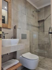 Kúpeľňa v ubytovaní Apartamenty u Kołodzieja