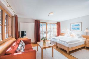 Rúm í herbergi á Felbermayer Hotel & AlpineSpa-Montafon