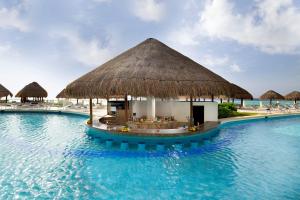 a resort in the middle of the water at Paradisus Cancun All Inclusive in Cancún