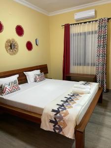 Postel nebo postele na pokoji v ubytování Havana Hôtel