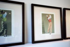 a group of framed pictures of a golfer at VILLA BIBI CHERI Elégante Suite de 35 M2 in Biarritz