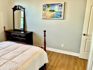 Postel nebo postele na pokoji v ubytování Cape Canaveral near Beach House
