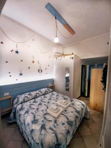 Postel nebo postele na pokoji v ubytování La Dimora di Mercurio