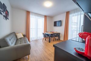 Televízia a/alebo spoločenská miestnosť v ubytovaní Apartmán na Bukovce MALMA