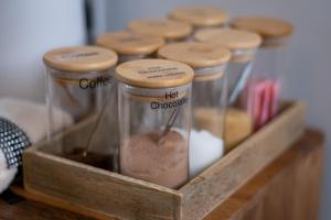 a wooden container filled with different types of food at Magnolia House, Rye in Rye