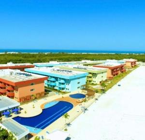 a rendering of a resort on the beach at Resort GoldenLake em Arraial do Cabo in Arraial do Cabo