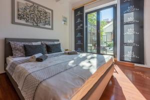 Posteľ alebo postele v izbe v ubytovaní House Sunshine