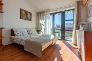 Posteľ alebo postele v izbe v ubytovaní House Sunshine